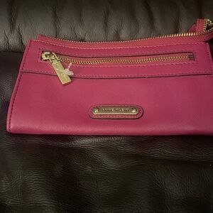 Anne Klein wristlet Solid dark pink/burgundy Color.  Like new never used.